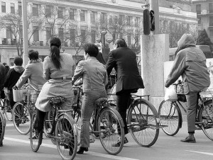 Here are some Chinese bicyclists who have stopped at a red light. See - it's not that hard to do! (photo by Matthew Stinson/Flickr)